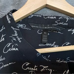 White House Black Market.  XL. Black polyester silky blouse with writing